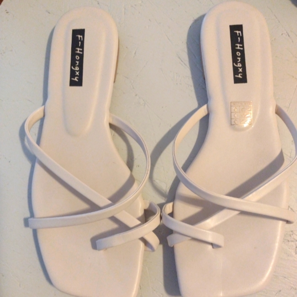 White flat sandals